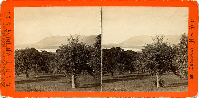side-by-side picture of an orchard overlooking the Hudson River, with a hill on the other side